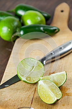 Tequila Shots With Lime Wedges Cut Up For Drinking At A Party. V