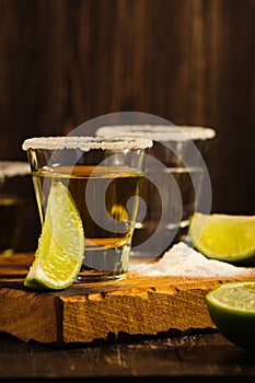 Tequila shots, salt and lime slices