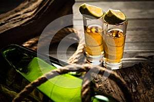 Tequila stack on a wooden background