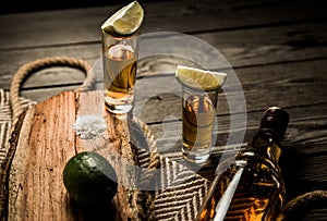 Tequila stack on a wooden background