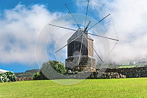 Portugal Azores, Terceira Island, Doze Ribeiras. Traditional windmill in the Azores photo