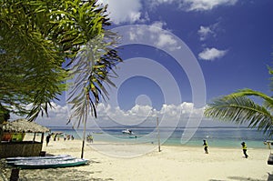 Terengganu most popular island, kapas Island surrounded by clear sea water and blue sky background.