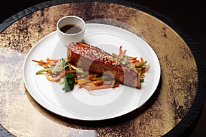Teriyaki salmon on white plate. Salmon Teriyaki