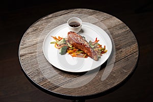 Teriyaki salmon on white plate. Salmon Teriyaki