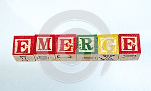 The phrase emerge displayed on a white background photo