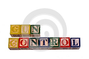 The term gun control visually displayed on a white background