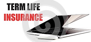 TERM LIFE INSURANCE text on white background with laptop and mouse