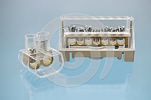 Terminal blocks and distribution blocks. Connecting electrical cables of different voltages. Connection to an electrical terminal