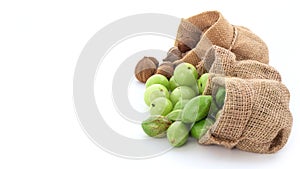 Terminalia bellirica, Terminalia chebula and Phyllanthus emblica fruits in sack isolated on white background