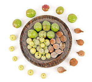 Terminalia bellirica , terminalia chebula and phyllanthus emblica or triphala isolated on white background.top view ,flat lay