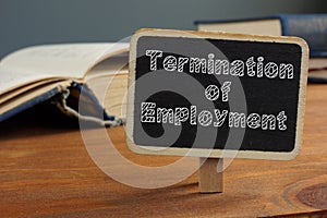 Termination of Employment is shown on the conceptual business photo