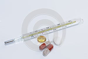 Termometer and pills photo