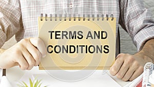 conditions text in legal agreement or document about service, insurance or loan policy. Lawyer or client holding