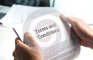Terms and conditions text in legal agreement or document. photo