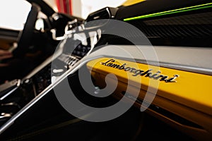 Ternopil, Ukraine- November 11, 2022:  Logo in dashboard of yellow Lamborghini Urus