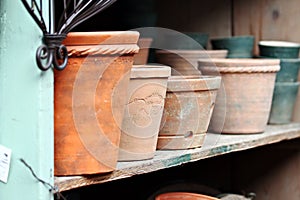 Terra Cotta Pots on Shelf