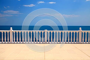 Terrace with balustrade overlooking the sea photo
