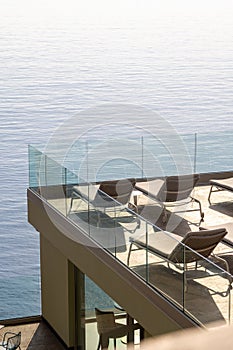 Terrace with bathing buns facing Mediterranean sea in Camogli, a fishing village and resort close to the peninsula of Portofino