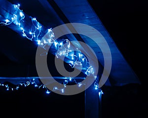 Terrace decorated with blue LED-garland