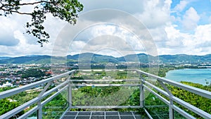 Terrace over looking view with a beautiful landscape scenery view of Tropical sea and mountain blue sky white clouds in Phuket