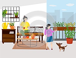 Terrace for relaxation. Mom is sitting on the sofa. The girl plays with the dog. Home garden interior - flowers and