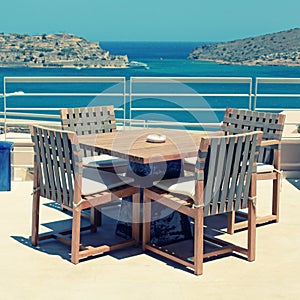 Terrace seaview with outdoor furniture in a luxury resort(Crete, Greece)