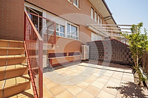 terrace of single family house with clay tile floor