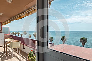 Terrace with table and seats in apartment in Vilassar de Mar photo