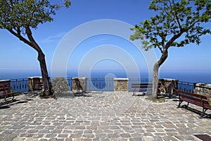 Terrace with trees and sea view