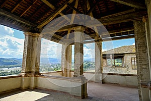 terrace view from the Castle Castello Torrechiara in Langhirano, Emilia-Romagna, Italy across ceiling and columns