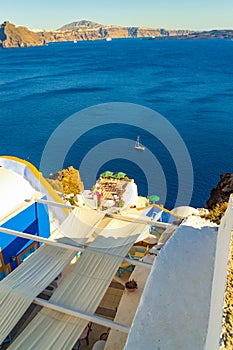 Terrace with view in Oia town Santorini and Caldera seascape Greece