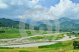 Terraced rice fields and traditional houses of the H`Mong ethnic people