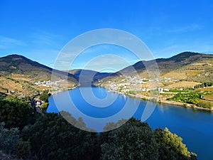 Terraced vineyards form the hillsides of Portugal`s Douro River valley