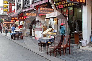 Terraces and restaurants with Chinese cuisine in the Old Street, Tunxi, China