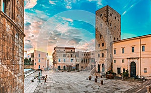 Terracina, Italy. Tower Of Cathedral Of San Cesareo And Town Hall In Sunny Day