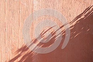 terracotta background with shadow overlay