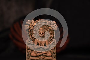 Terracotta Buddha of Sarnath, Varanasi, India in meditative peaceful posture