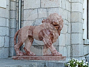 The terracotta figure of the lion in of the main entrance to the Yusupov Palace.