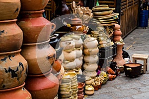 Terracotta pots and pans piled up in a shop in Cuenca, Ecuador