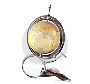 Terrestrial globe and magnifying glass