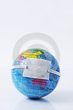 Terrestrial globe with a protective mask