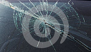 Terrible dangerous car after a fatal accident. Broken windshield