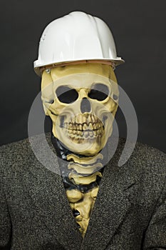 Terrible dude in mask of skeleton with helmet