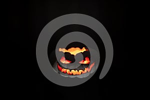 A terrible pumpkin with burning eyes. Halloween is coming soon