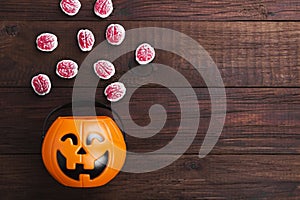 Terrible sweets brains for Halloween in decorative pumpkin on
