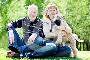 Terrier dog and family