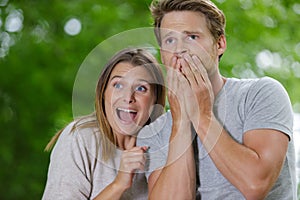 Terrified couple in countryside