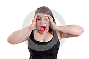 Terrified woman holding her head with both hands