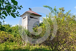 The territory of abandoned secret military bunker. Creepy place, post-apocalyptic background