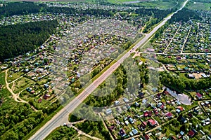 Territory heavily built up with dachas on both sides of the highway